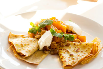 homemade pancakes with vegetables and pumpkin. Restaurant dish.