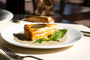a slice of vegetable pie with cheese