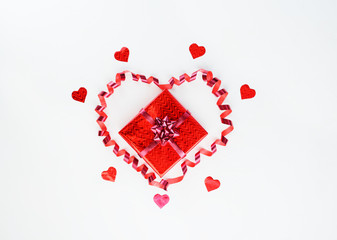 Greeting card in the form of a gift inside a heart made of packing tape. Valentine's day concept.
