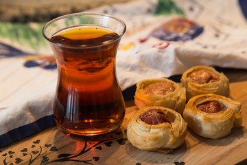 .tea, bagel, hot dog puff pastry concept