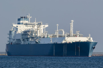 LNG TANKER - The gas supply ship is sailing at the port breakwaters
