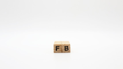 TOKYO, JAPAN. 2020 Jan 5th. Wooden Text Block of FB on Isolated Background