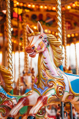 A Traditional Horse on a Fun Fair Carousel Ride. Merry-go-round wooden horses.