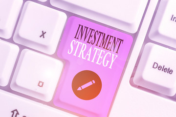 Handwriting text writing Investment Strategy. Conceptual photo the systematic plan to allocate...