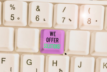 Writing note showing We Offer Solutions. Business concept for Offering help assistance Experts advice strategies ideas