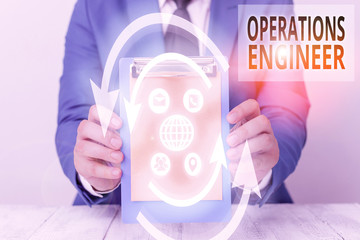 Writing note showing Operations Engineer. Business concept for analyze and design operation that will improve work flow