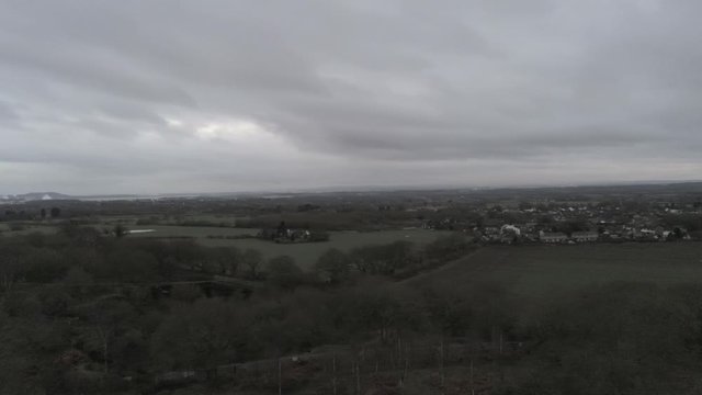 Pex hill woodland quarry parkland walk. Dense woodland countryside farmland landscape. Pull back descend.