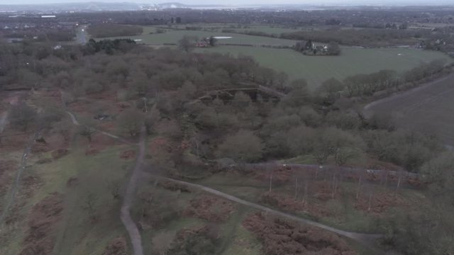 Pex hill woodland quarry parkland walk. Dense woodland countryside farmland landscape. Dolly right above trail.