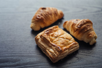 croissant on a wooden table