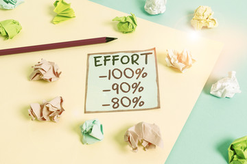 Word writing text Effort 100 90 80. Business photo showcasing Level of determination discipline motivation Colored crumpled papers empty reminder blue yellow background clothespin