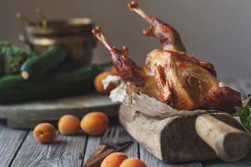 Baked guinea fowl on a rustic background