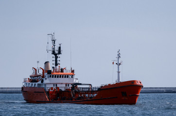 BUNKER TANKER - The ship with fuel goes to port