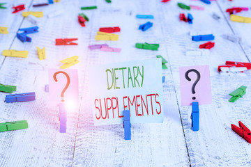 Text sign showing Dietary Supplements. Business photo showcasing Product taken orally intended to...