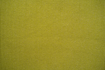 Textured yellow fabric background.