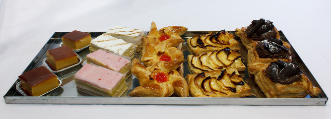 Assortment of delicious puff pastry cakes.