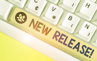 Writing note showing New Release. Business concept for announcing something newsworthy recent...