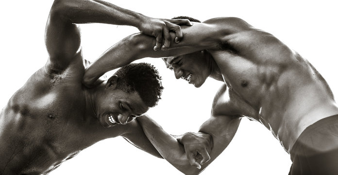 Strong Male Black Athletes Wrestling. Strength Competition. 