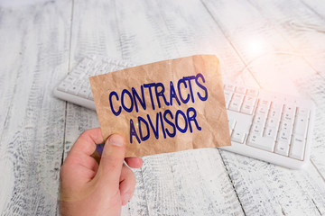 Writing note showing Contracts Advisor. Business concept for ensure the enforcement of defined...