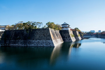 Fototapeta na wymiar Fortification and ditch water around Osaka Castle for protection