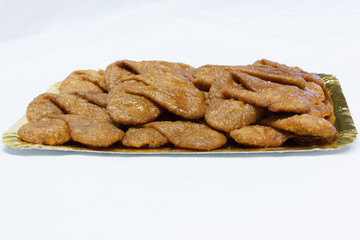 Typical Spanish Christmas cake made with dough and honey.
