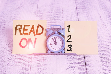 Text sign showing Read On. Business photo text spend time reading in order to find out information...