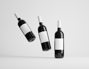 Three red wine bottles mockup over white background. 3D render