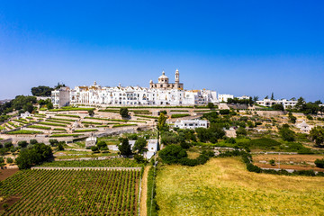 Aerial view ,neoclassical church of San Giorgio Martire, Locorotondo, Valle d’Itria, Apulia,...