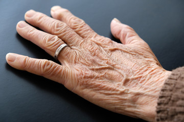 Fototapeta premium 80 years old woman's hand, old human hand with veins