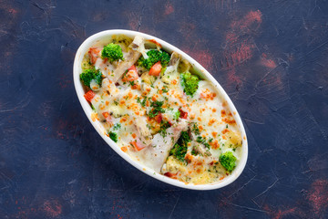Broccoli and pike gratin with cheese, top view