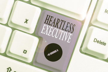 Handwriting text writing Heartless Executive. Conceptual photo workmate showing a lack of empathy...