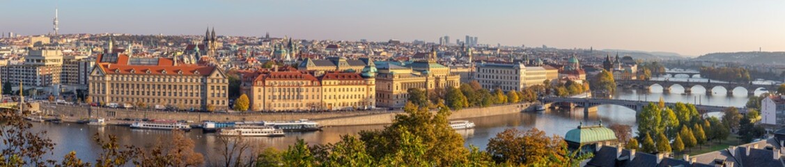 Naklejka na ściany i meble Prague - The panorama of the city with the bridges in evening light.