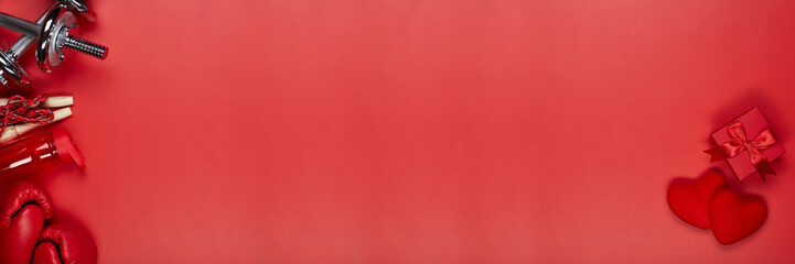 Sport equipment and red hearts. Valentine's Day. Fitness, sport, healthy lifestyle. Extra wide panorama banner background