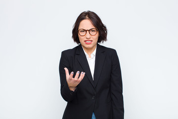 young businesswoman looking angry, annoyed and frustrated screaming wtf or what‚Äôs wrong with...