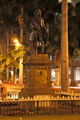 Bronze Statue of Mahé de La Bourdonnais between the two one way lanes of the Intendance Street...