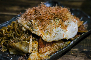 Okonomiyaki, Japanese pancake served on plate