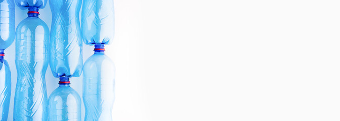 Frame of plastic bottles isolated on white background