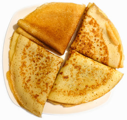 Traditional Russian pancakes on a plate. Handmade. In isolation. Top view