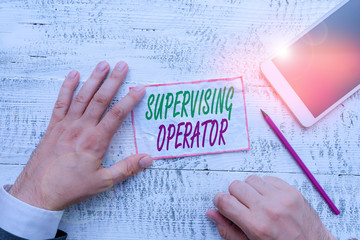 Conceptual hand writing showing Supervising Operator. Concept meaning monitoring and coordinating...