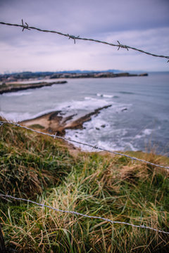 Plage derrier la cloture