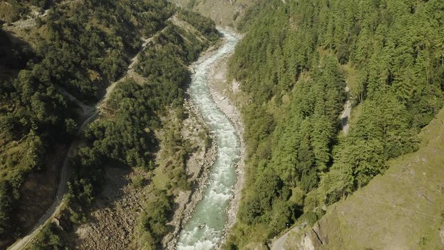 Ganganani, Uttarakhand, India, drone flight down the valley of Bhagirathi river near Ganganani, a small mountain village famous for it's hot springs, amid vast and dense deodar cedar forests