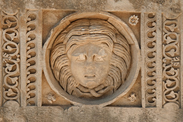 Carved Greek masks as decoration from the theatre of of Myra, Turkey