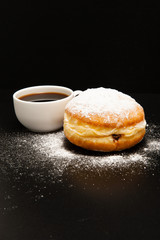 Cup of coffee with donut
