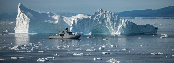 Beautiful landscape with large icebergs  © surangaw
