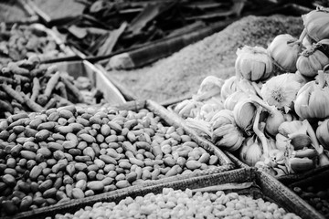 Black and white picture of vegetables, herbs and nuts on the old souk of Casablanca, Morocco