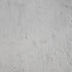 Old peeling paint on the wall..Red abstract background..Beautiful gray textured stucco on the wall..Background from gray stucco.
