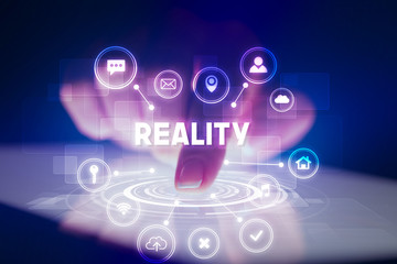 Finger touching tablet with web technology icons and REALITY inscription, web technology concept