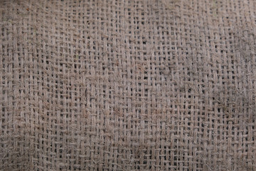 The texture of the brown canvas bag.