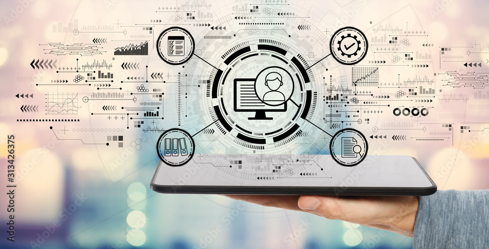 Wall mural document management system concept with man holding a tablet computer