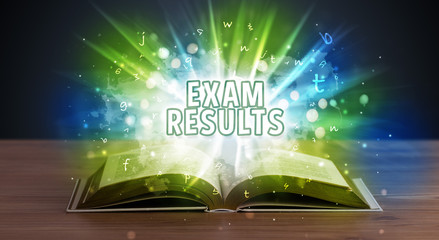 EXAM RESULTS inscription coming out from an open book, educational concept