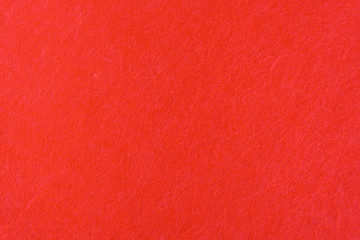 Abstract background with red felt texture, top view